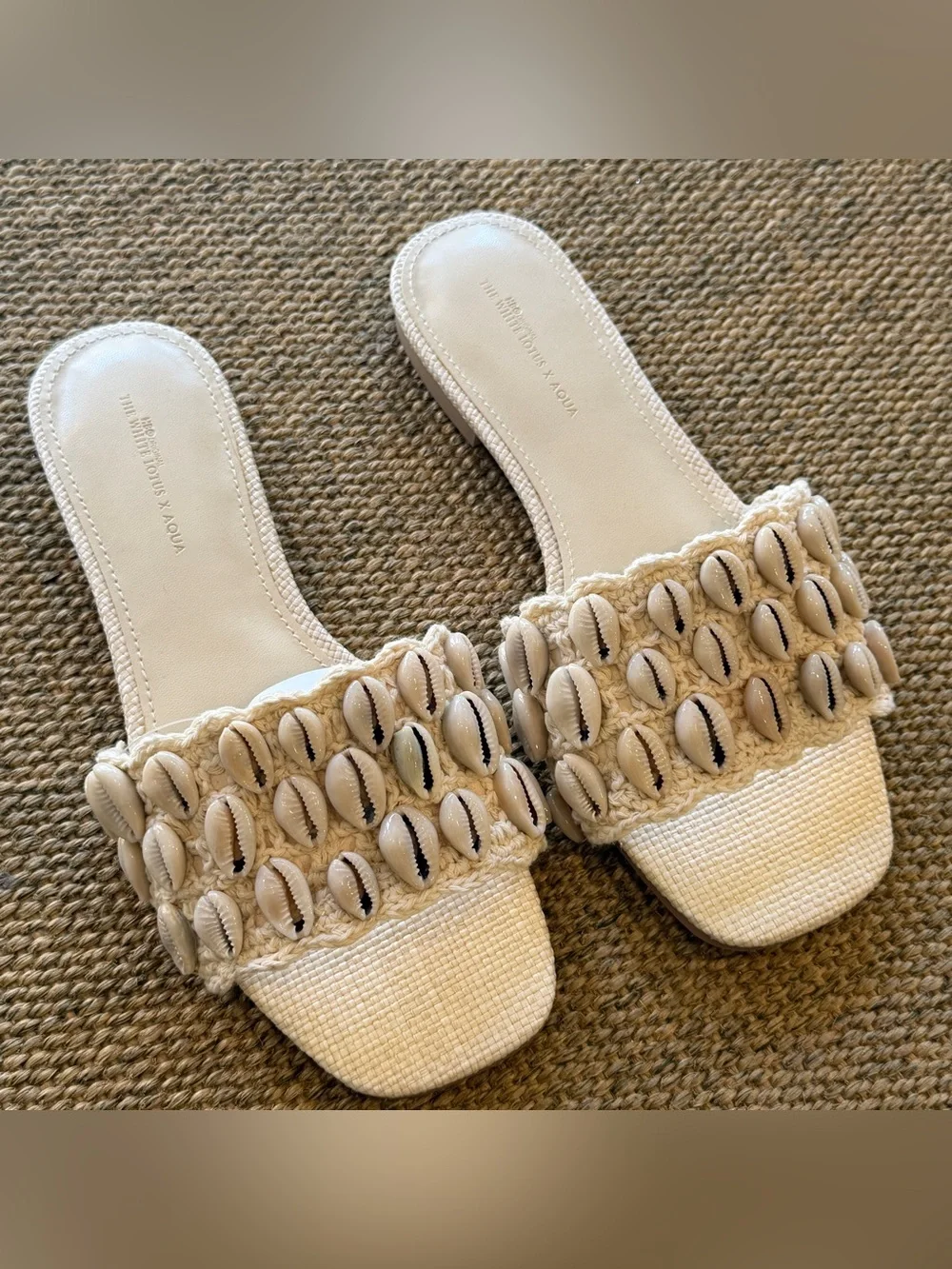Aqua x The White Lotus collab shell sandals